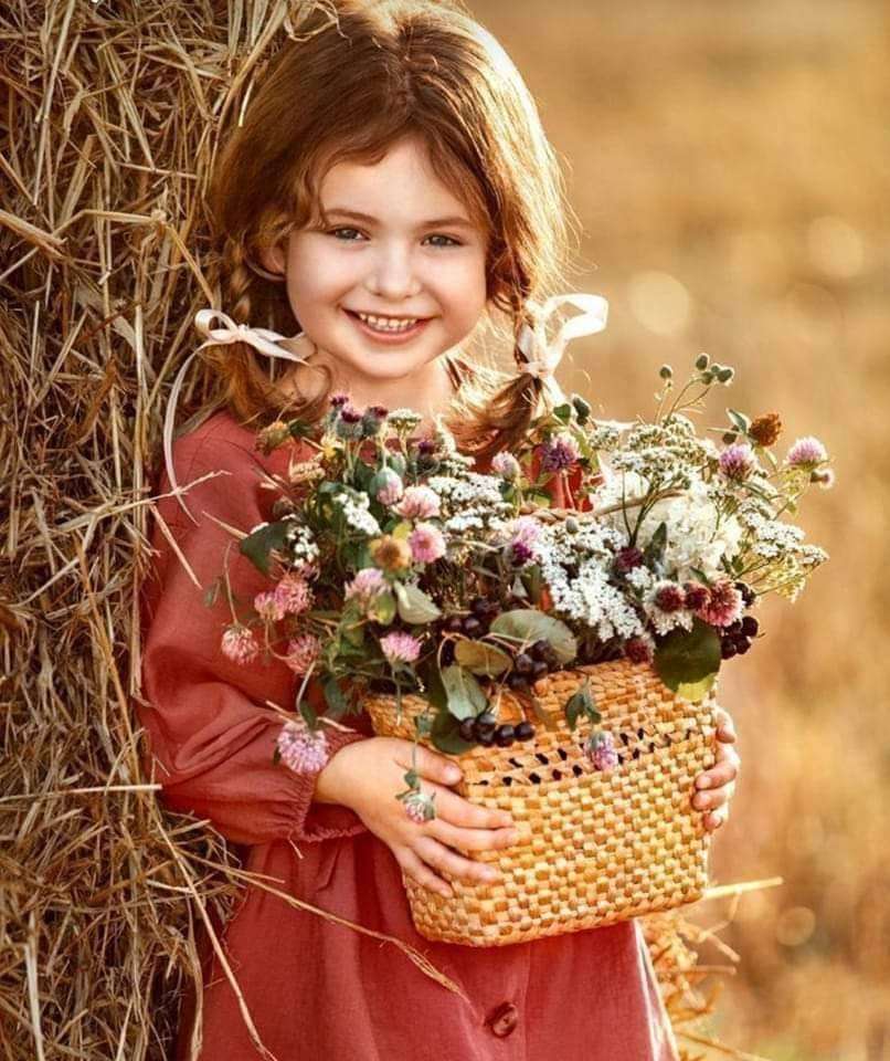 Dziewczynka z kwiatami puzzle online