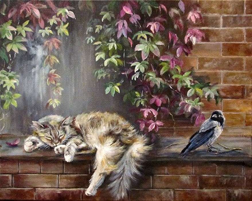 kitten slaapt naast een vogel puzzel