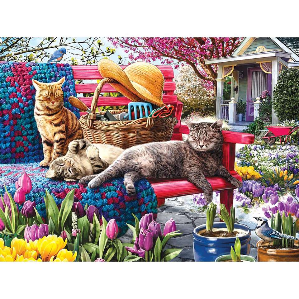 Kotki na ławce przy domu puzzle online