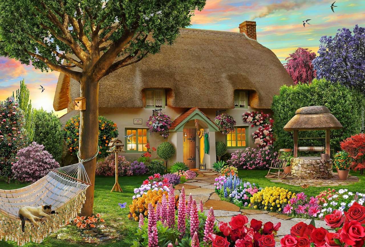 Mały wiejski domek otoczony ogrodem puzzle online