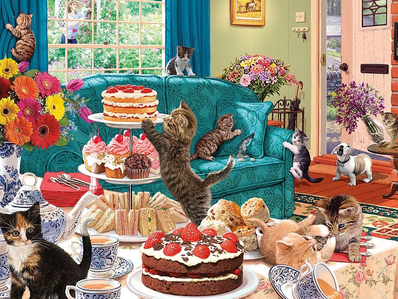 Słodkości na stole i rozrabiające koty puzzle online