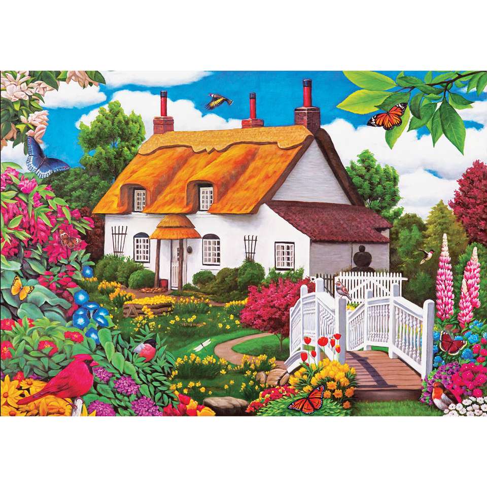 Dom pod strzechą z posesją w kwiatach puzzle online
