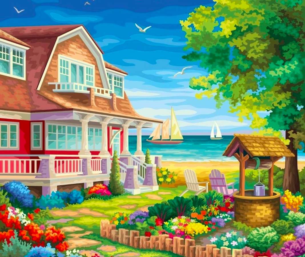 Piękny dom z gródkiem na plaży puzzle online