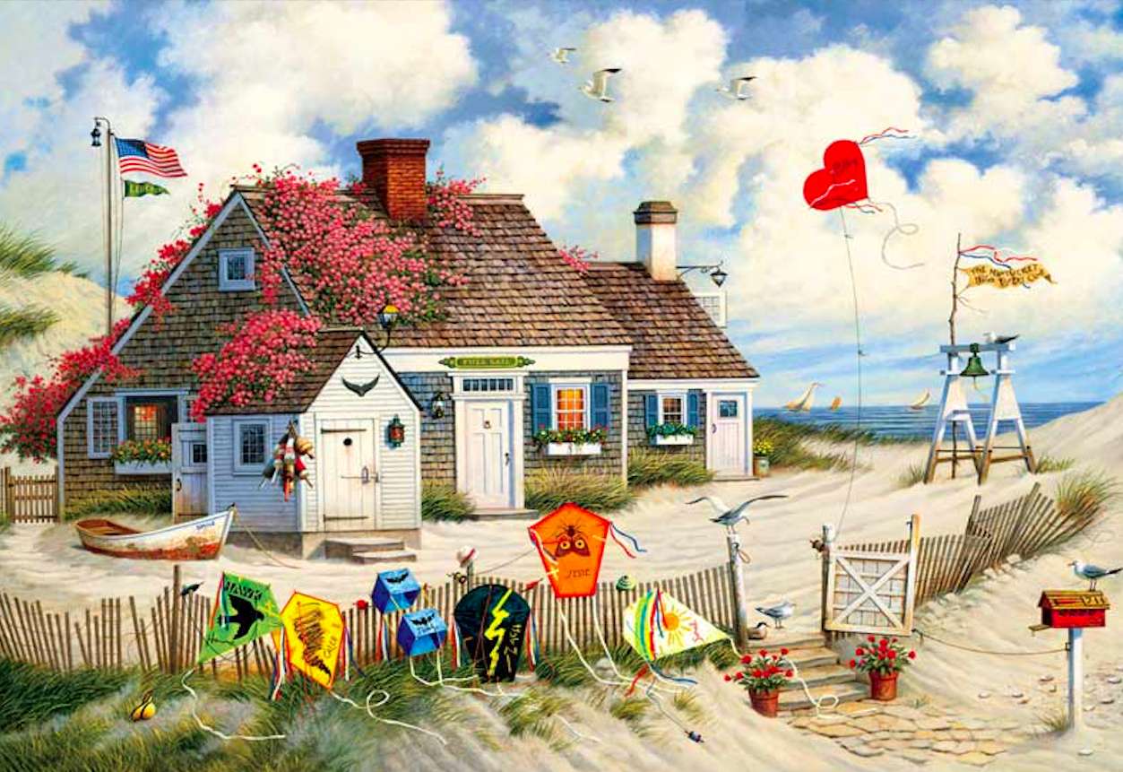 Domek na plaży z kwiatami na dachu puzzle online