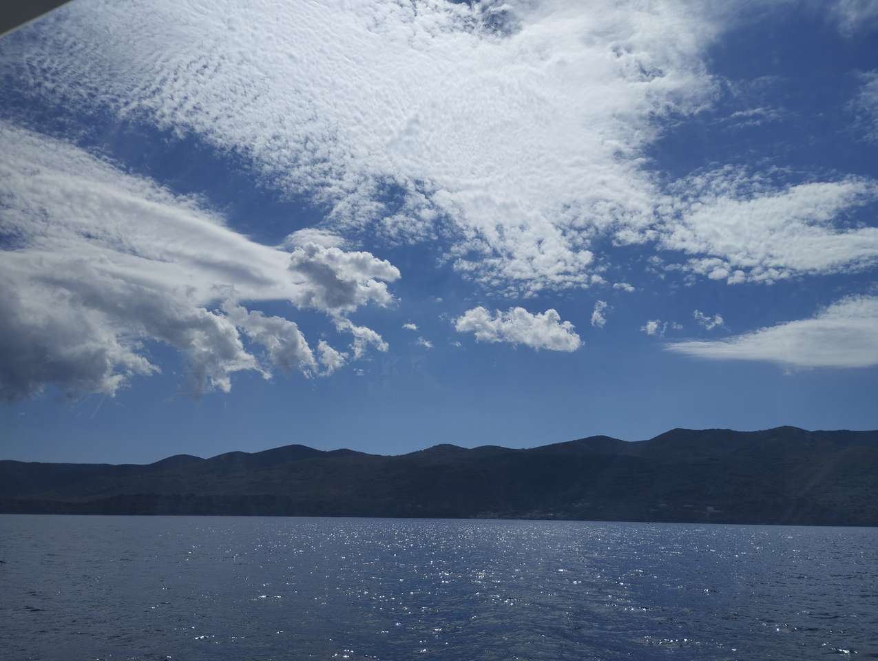 Zachmurzone niebo nad Adriatykiem puzzle online