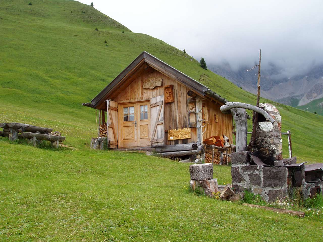 drewniana chata w Dolomitach Trentino puzzle online