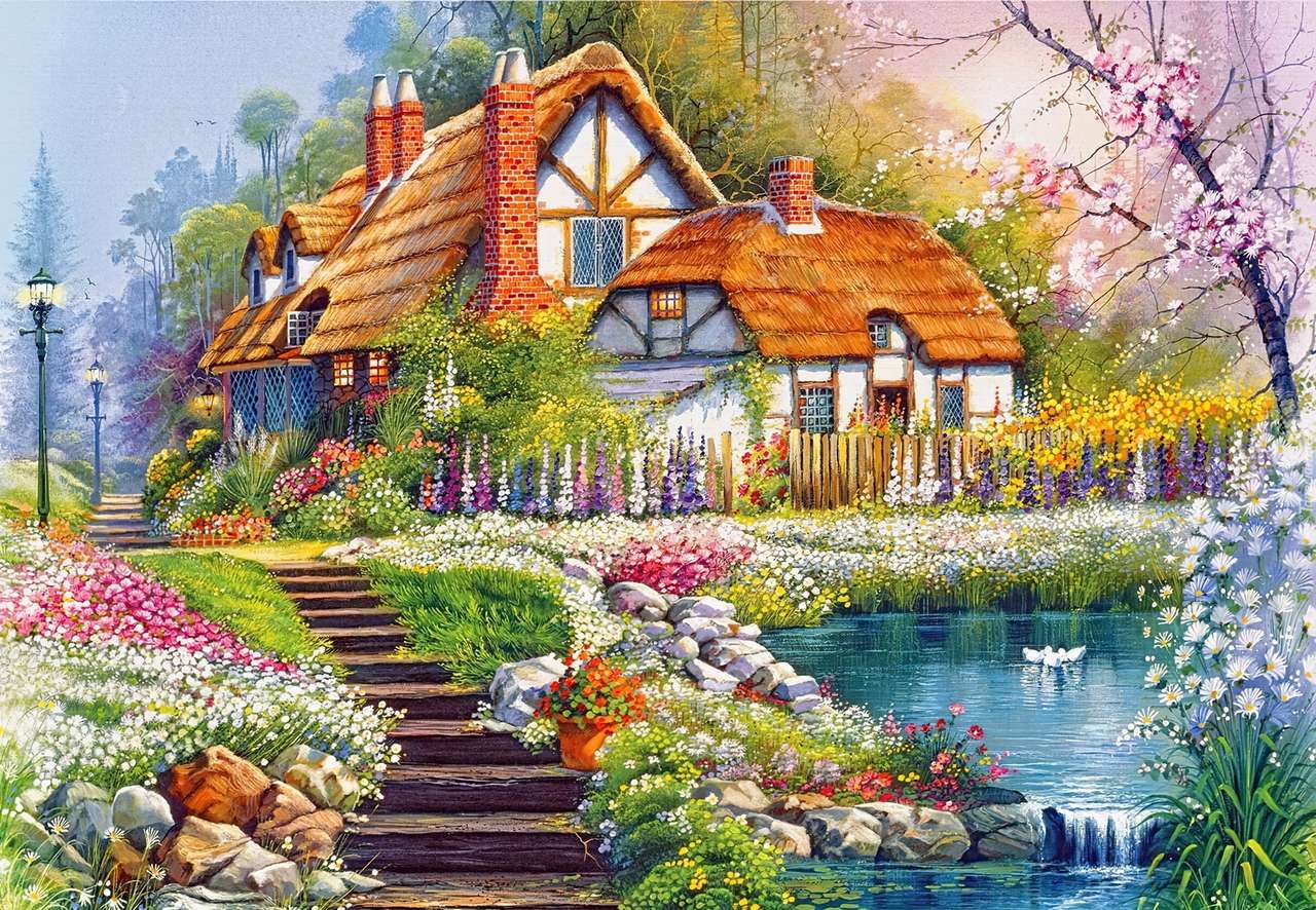 Piękny dom z kamiennymi schodkami i stawem puzzle online