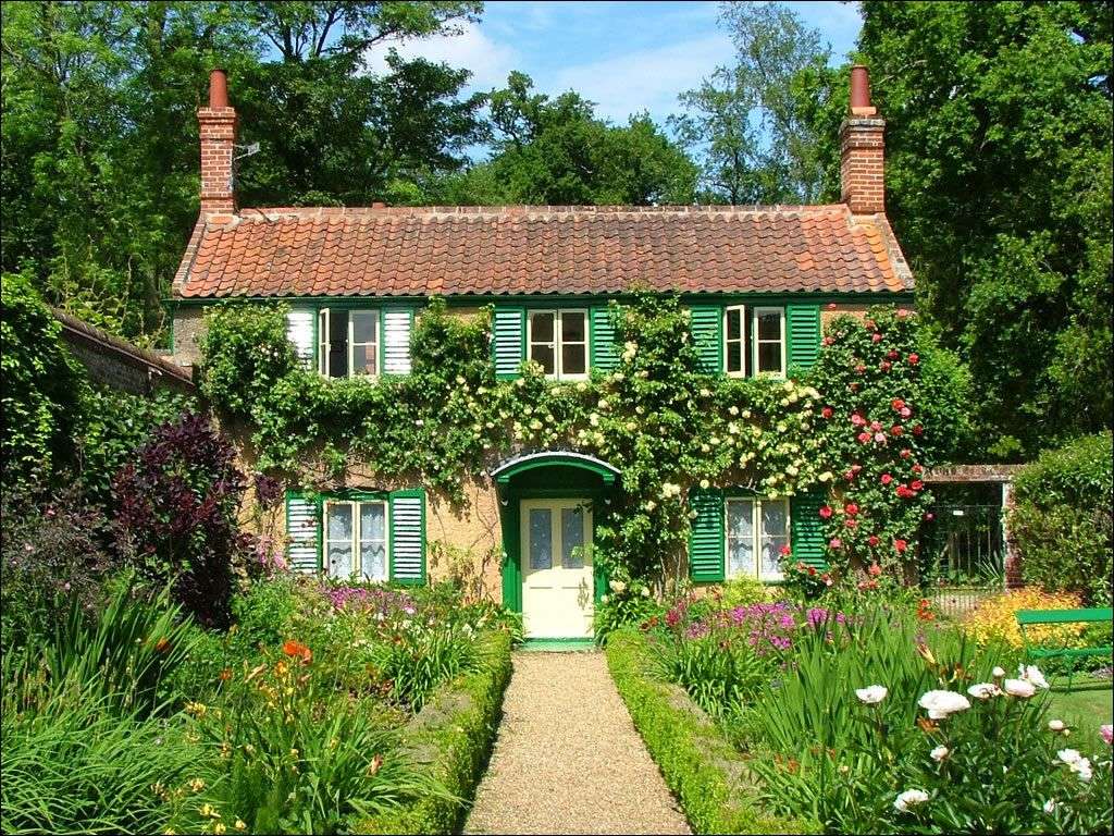 Wiejski w stylu country ludowy dom cały w kwiatach puzzle online