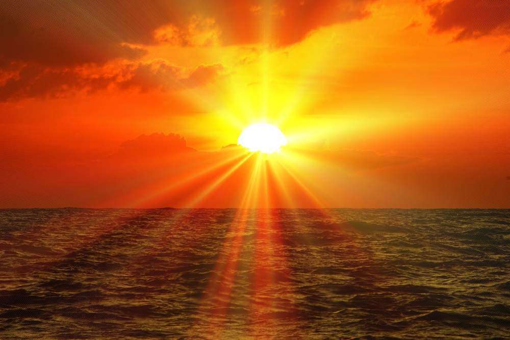 Słońce na morzu puzzle online