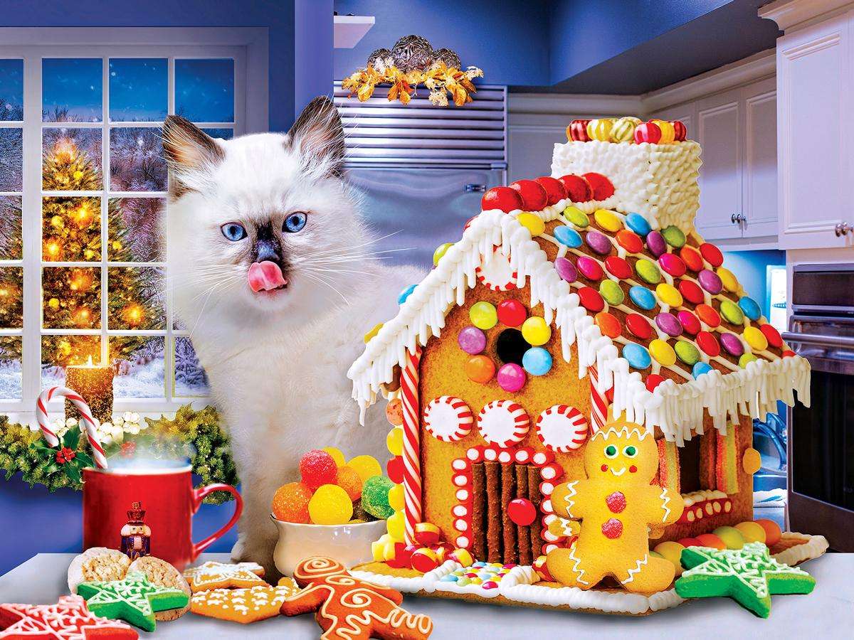 Kotek pry słodkim domku z piernika puzzle online