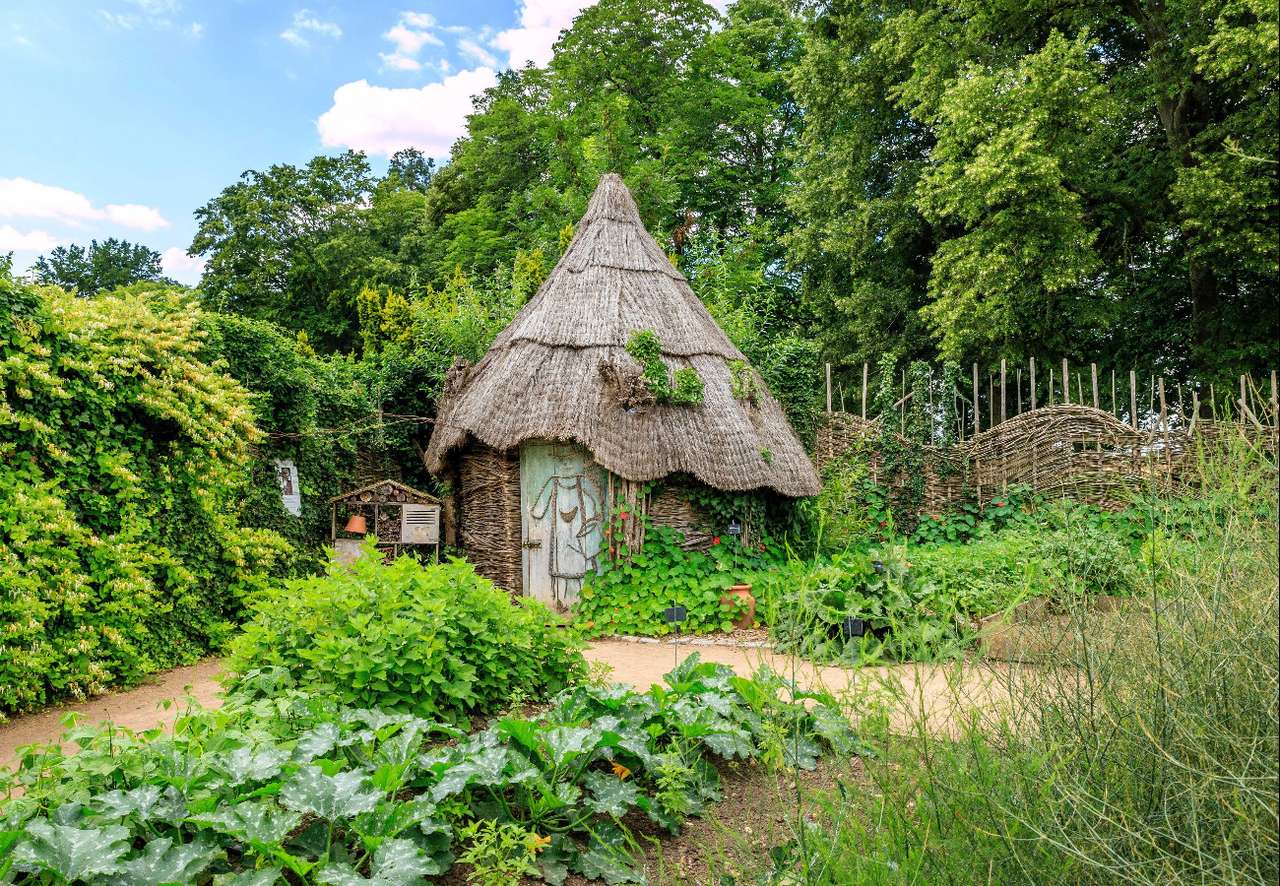 Orleański ogróde z śmiesznym domkiem puzzle online
