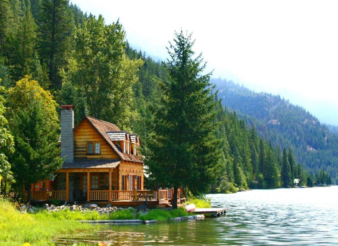 Dom z bali nad pięknym jeziorem puzzle online