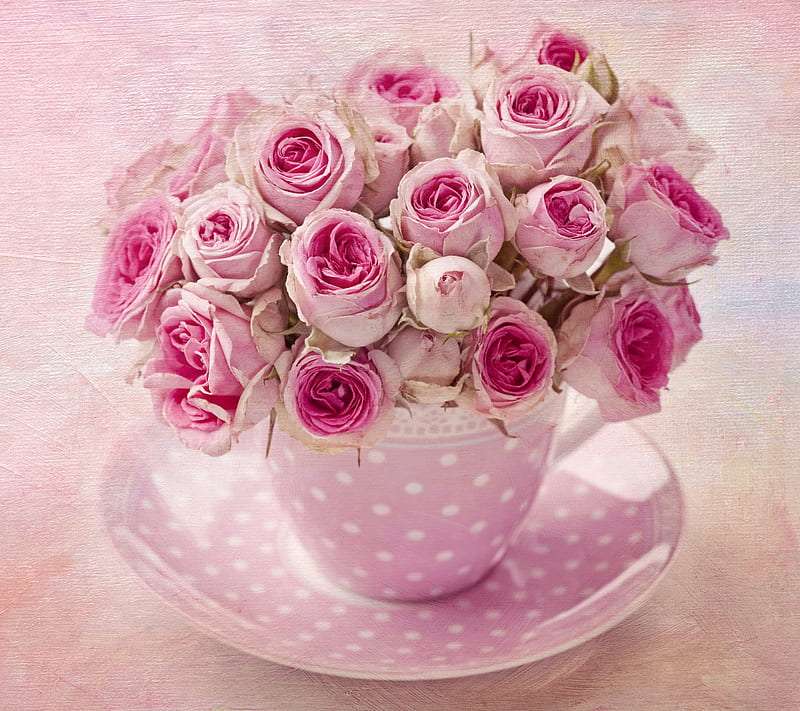 Różowe róże w ślicznej różowej filiżance puzzle online