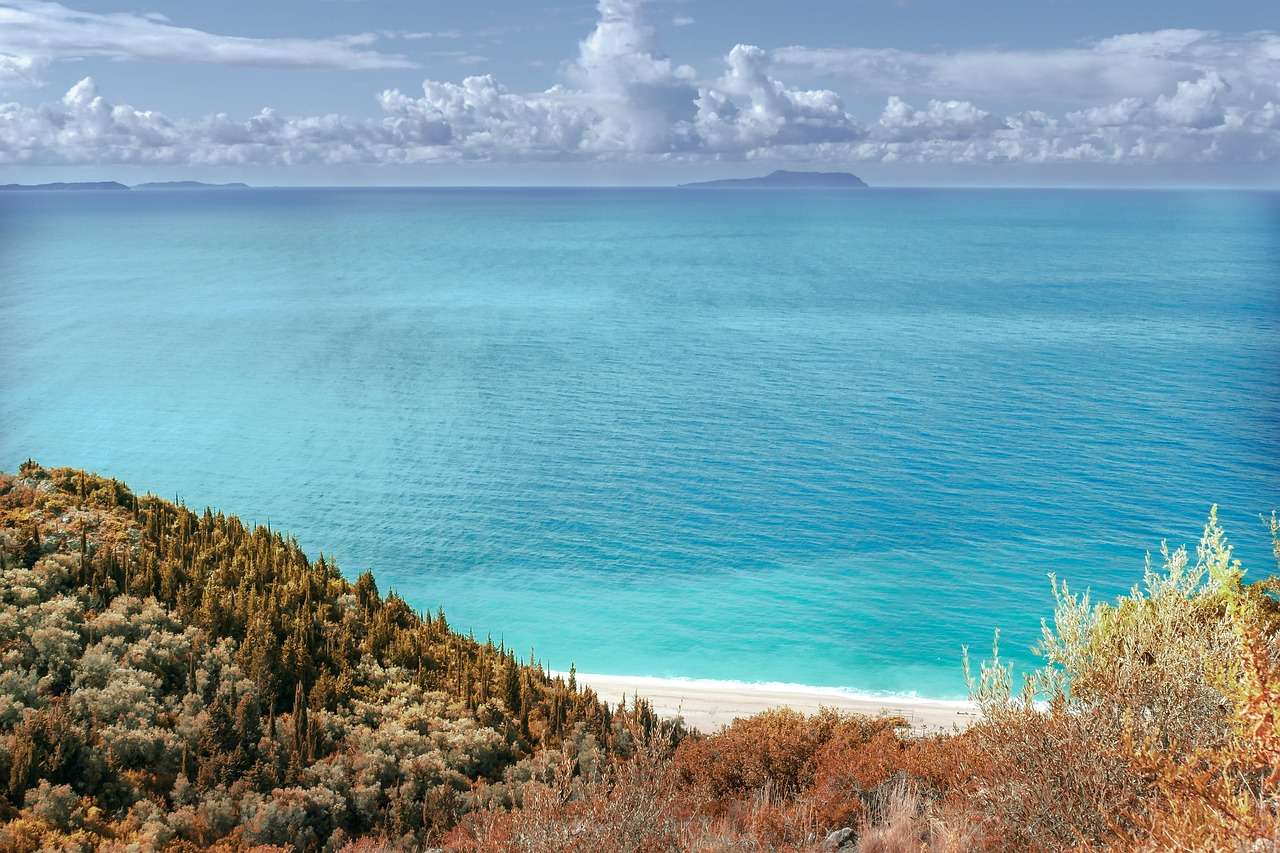 Woda morska Albania Ocean Plaża Niebo Piasek Niebieski puzzle online