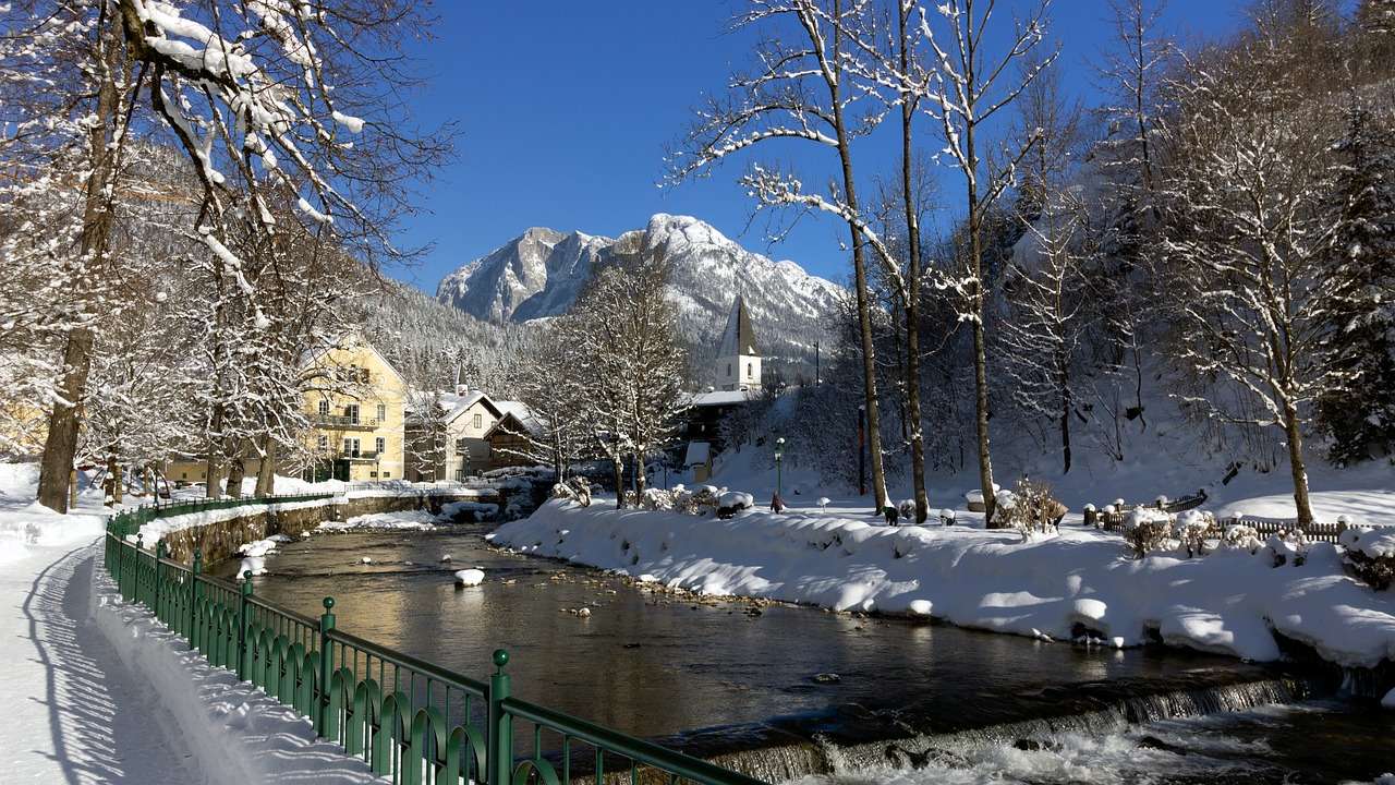 Wieś, rzeka, zima puzzle online