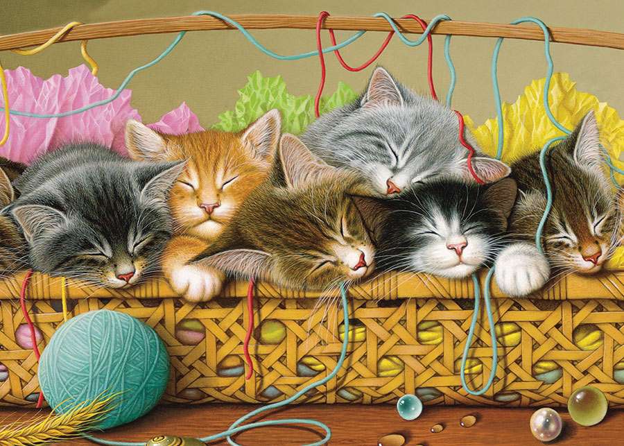 Śpiące kotki w koszu z wełną puzzle online