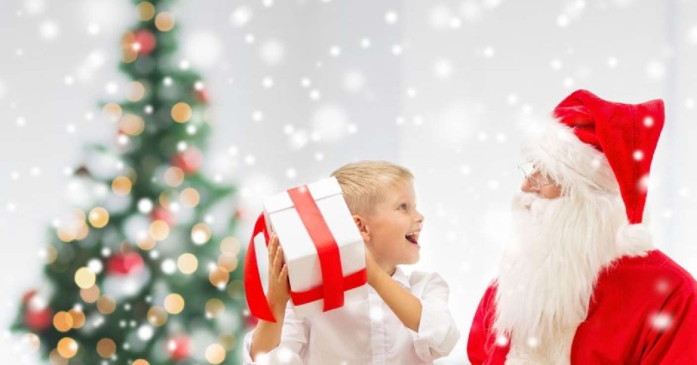 dziecko i Mikołaj z prezentami biały puzzle online