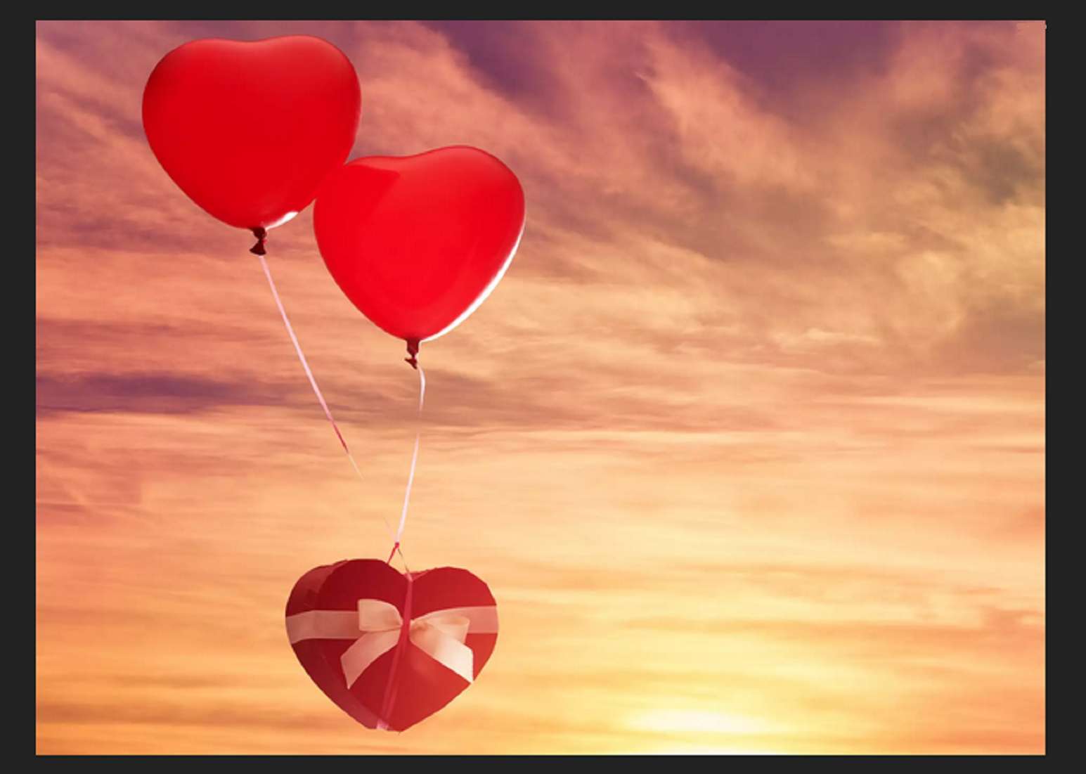 dwa czerwone balony w kształcie serca puzzle online