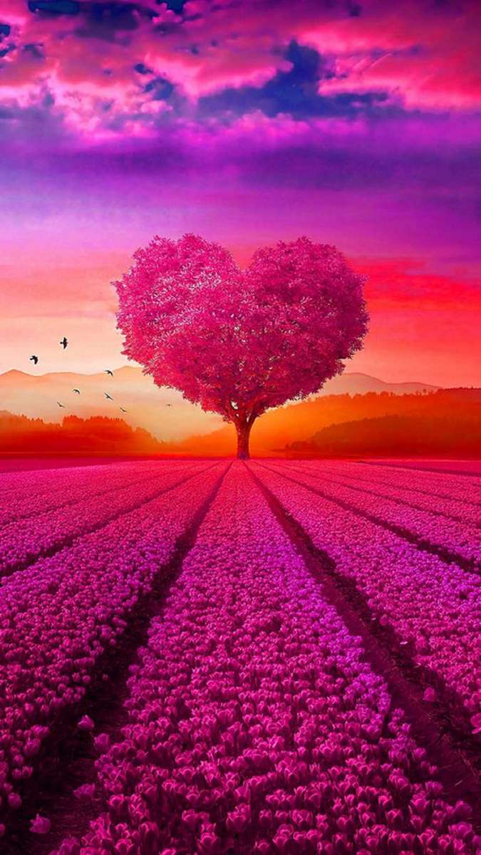 piękne drzewo serc na różowej łące zachód słońca puzzle online