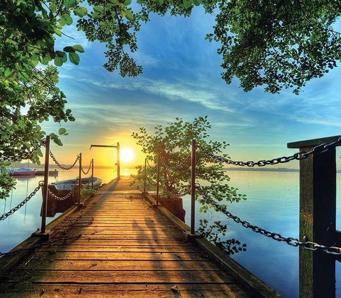 Pomost na jeziorze o wschodzie słońca puzzle online