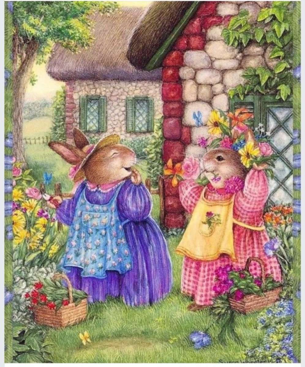 Króliczki w ogrodzie kwiatowym. puzzle online