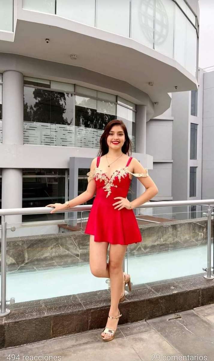 Piękna w czerwonej sukience puzzle online
