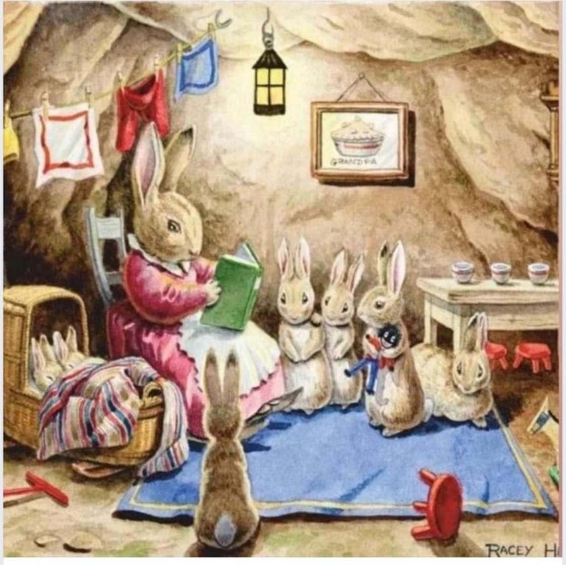 Czytanie historii wielu królikom. puzzle online