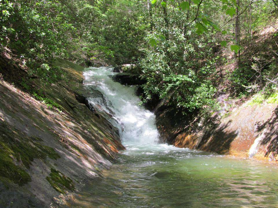 Mountain creek and waterfall puzzle online