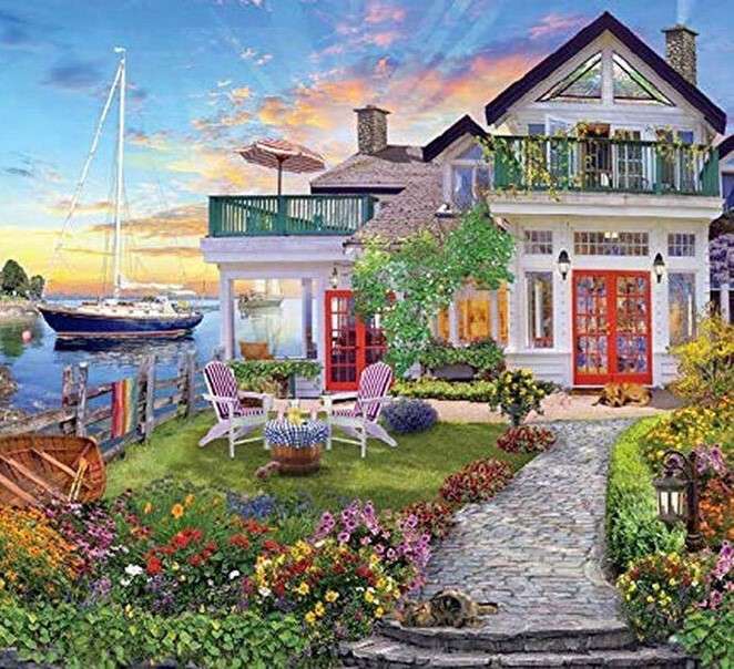 Dom z piękną posesją przy brzegu morza puzzle online